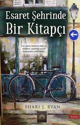 Esaret Şehrinde Bir Kitapçı - Shari J. Ryan | Arkadya - 9786254431067